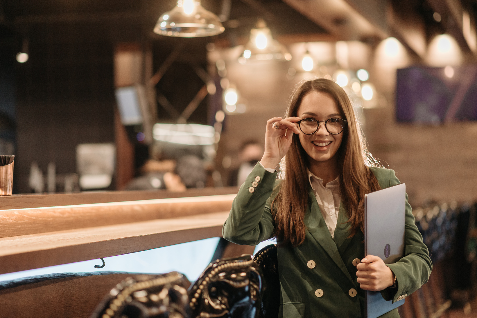 A Woman in a Green Business Suit